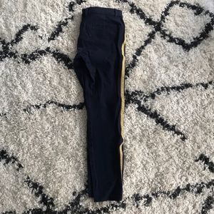 Navy blue pants with gold stripe
